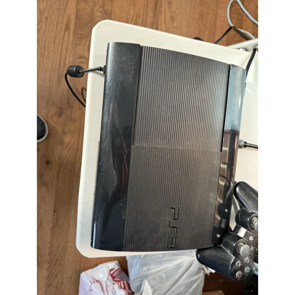 PlayStation3 PS3 Super Slim With Controller And Cable , Works Great